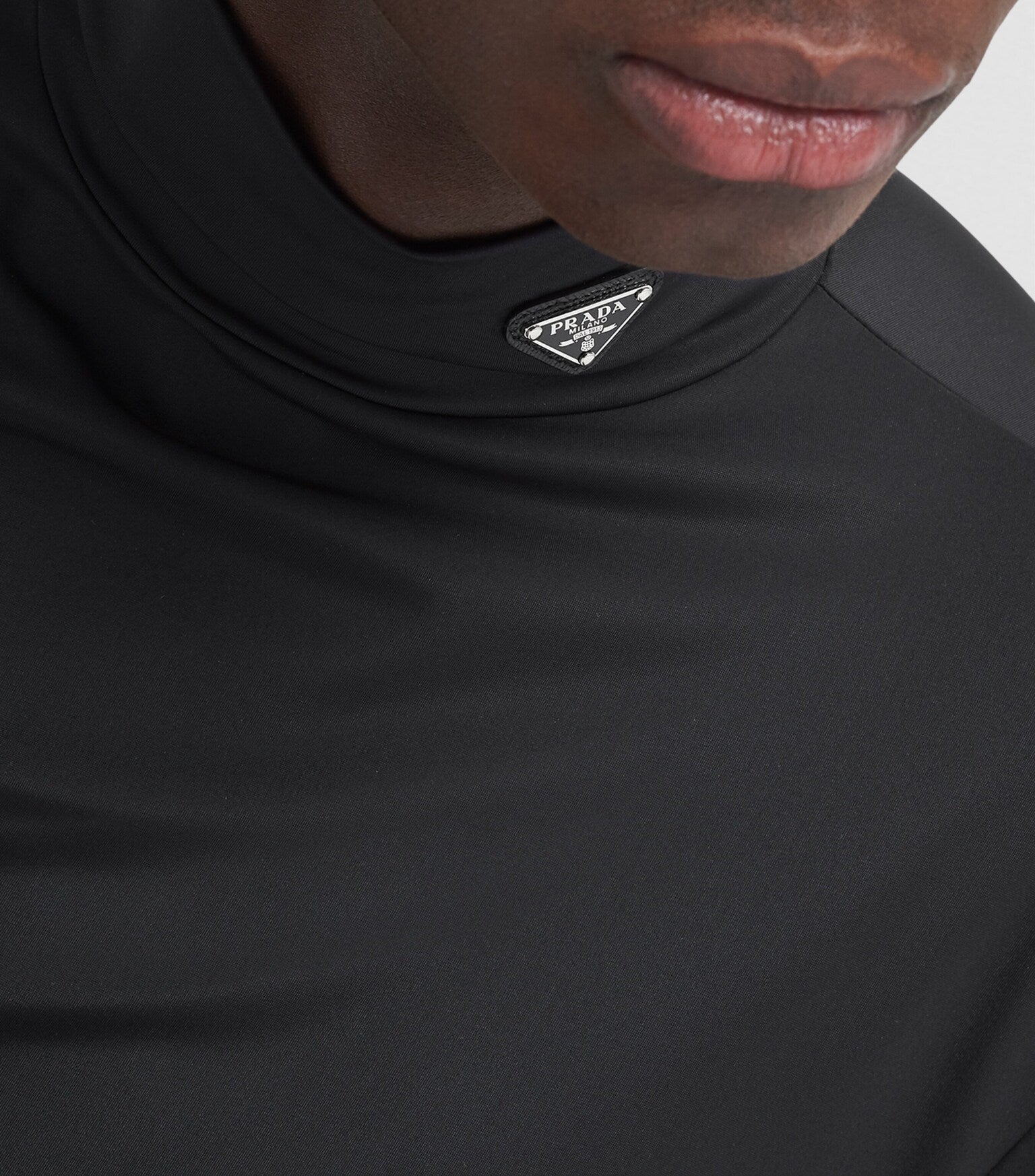 Prada  Folded neck top and triangular brand logo