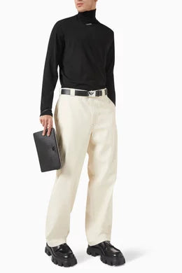 PRADA
Logo Turtleneck Sweater in Virgin Wool