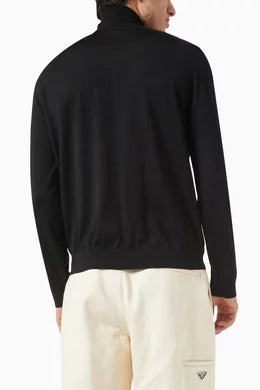 PRADA
Logo Turtleneck Sweater in Virgin Wool