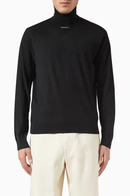PRADA
Logo Turtleneck Sweater in Virgin Wool